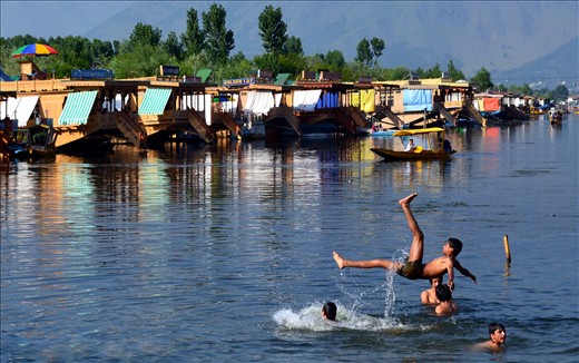 Children enjoying in the most known lake in  kashmir -Dal lake.