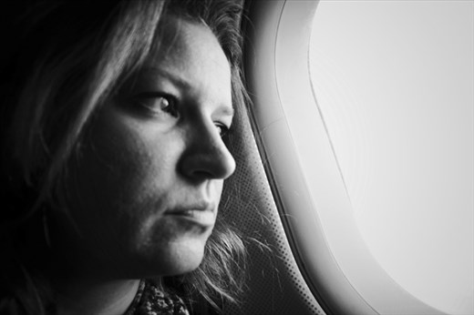 Me looking through the airplane window