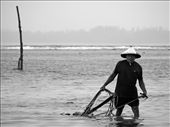 Fisherman out in the sea, while the rain is falling, but he has no choice.: by abroad, Views[277]