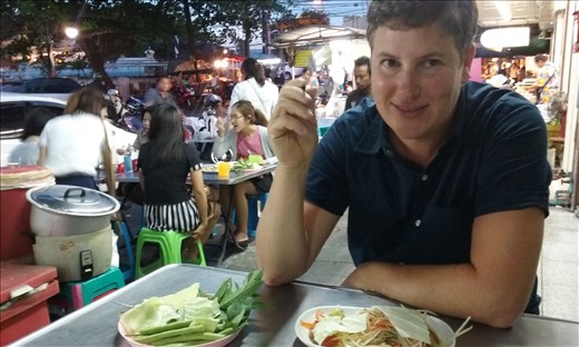 my first taste of thai street food was a very hot green papaya salad
