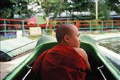 A young monk gets ready to set off on a water ride in a theme park in Mandalay.: by achidell, Views[433]