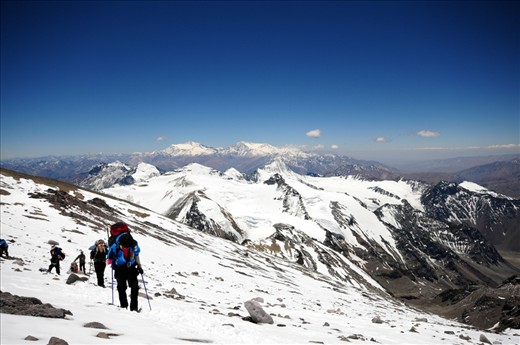 A mountaineering team makes its way up along the snow covered trails leading to the second of three high camps of Mt. Aconcagua.