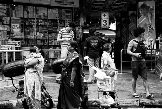 In front of Mustafa Department Store, where there are a lot of selections to be bought. From toiletries until saree. 