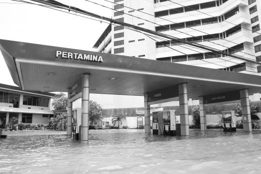 The floods slowing down the country's economy, the government loosing money. 