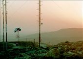 Riding the hilly landscape at dusk, the surveillance antennas feel like masts of a ship, sailing in the desert sea.   : by adamp, Views[382]