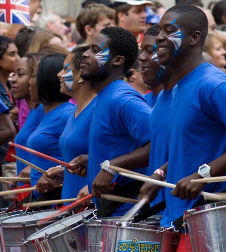 Marching drum line at the Olympic Parade. Crowds cheering at to the music !