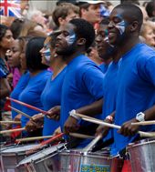 Marching drum line at the Olympic Parade. Crowds cheering at to the music !: by adampassingham, Views[336]