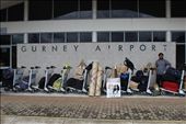 A lone passenger waiting for the flight to Port Moresby at Alotau Gurney Airport: by adilahdolaiano, Views[664]