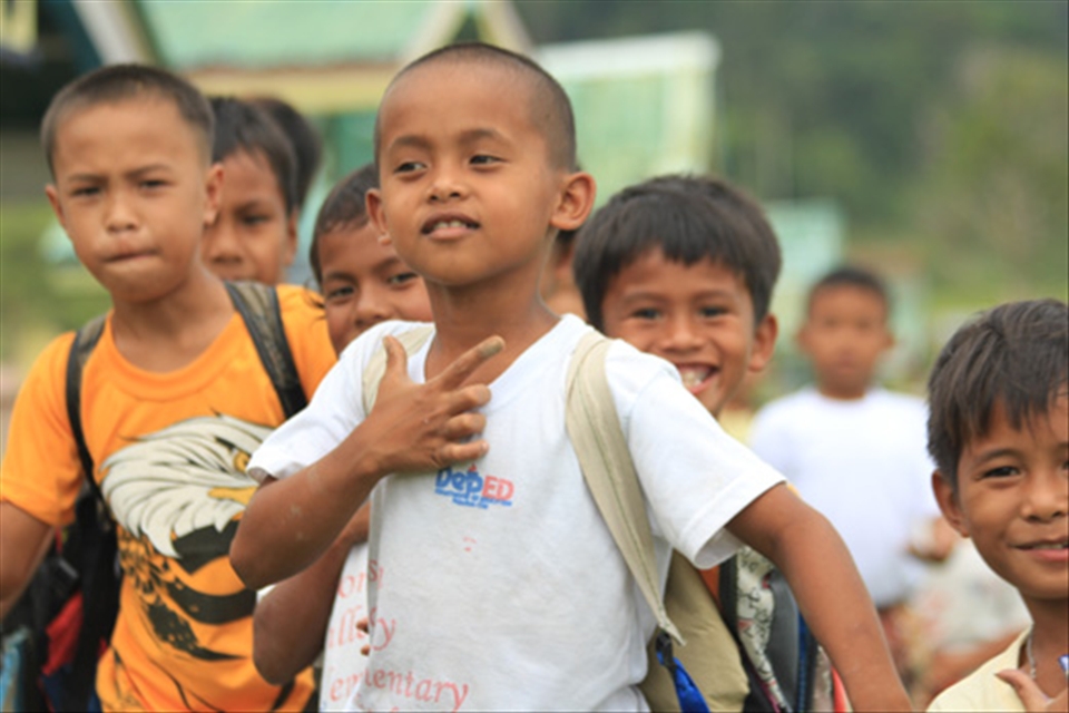 Ready Smile. These pupils were headed home when they pass at me and ask for a pi
