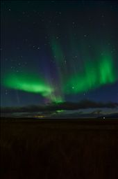 The Aurora Borealis illuminates the sky over Iceland's West Fjords.: by adventureiceland, Views[335]