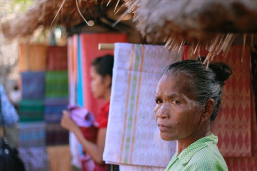 Houses turned into little souvenir shops. And this woman watched people come and go within small alleys around the village. Her expression was vague, was she comfortable having her village being tourist destination or did she dislike the crowds? 