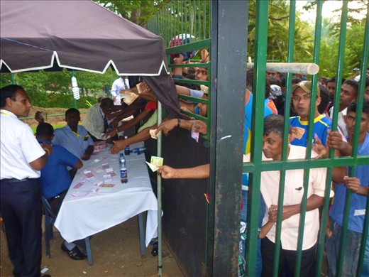  The line up to buy tickets to the Sri Lanka vs India 20/20 cricket match. Both 