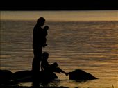 A father enjoys a sunset with his children from the shore of Clearwater Lake.: by afoolishman, Views[281]