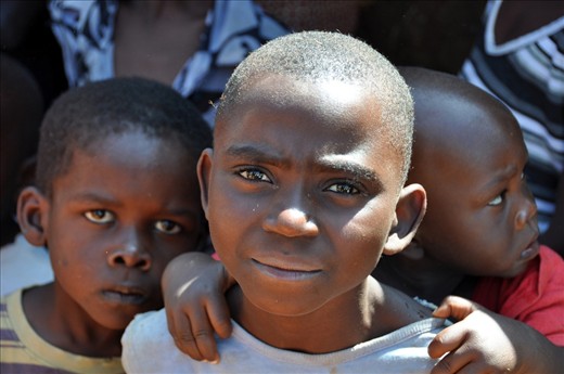 Emanuel,taking care of 1 of 5younger siblings,is 1st born from father's 1st marriage.His father's 2nd marriage produced 4step-siblings.Their father's farmer earning <$1p/d to feed >10mouths.Kenya's polygamist where next marriage leaves fewer resources for previous wife&less opportunity for her children,becoming caregivers.Now Emanuel can only dream of having more decent life.His eyes're full of hope,promise and faith that one day he'll be rewarded with the life children of his age deserve.