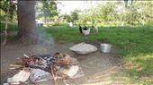 PHOTO-I: 
This photo is taken in a picturesque Kosovarian village that I have recently visited, and it shows the traditional way of preparing traditional food. In past, this method has been widely used throughout the country for baking. Nowadays it is used just sometimes to make/bake our traditional food, called “flija” because if flija is baked in this way, it will be very delicious. This takes place outside, during sunny days, and in general, it is a hard work. 
: by afrim, Views[584]