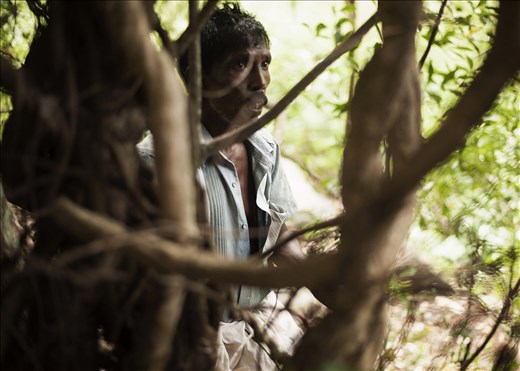 A honey hunter ready to set off into the forest. 