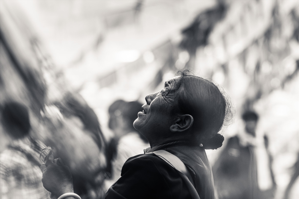 A woman is saying her prayers for her family and personal aspirations