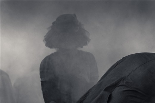 It is special full moon day and the smoke of the incense is hiding the people