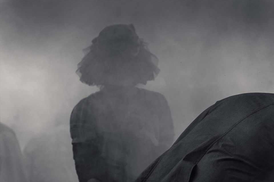 It is special full moon day and the smoke of the incense is hiding the people