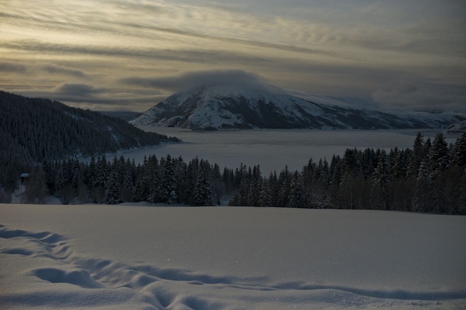 Daylight fades behinds the mountain of Esperviktinden from the Hemnes Peninsula