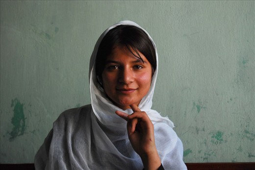 Most children especially girls were not allowed to attend school because of war and conflict in Afghanistan. That has now changed in areas of the country. The teenage girl in this image is catching up in her studies at a girl’s school run by a local organization Afghans4Tomorrow. 
