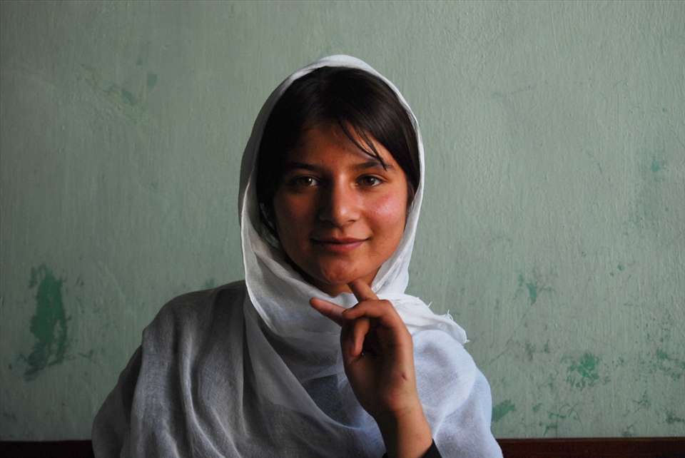 Most children especially girls were not allowed to attend school because of war and conflict in Afghanistan. That has now changed in areas of the country. The teenage girl in this image is catching up in her studies at a girl’s school run by a local organization Afghans4Tomorrow. 
