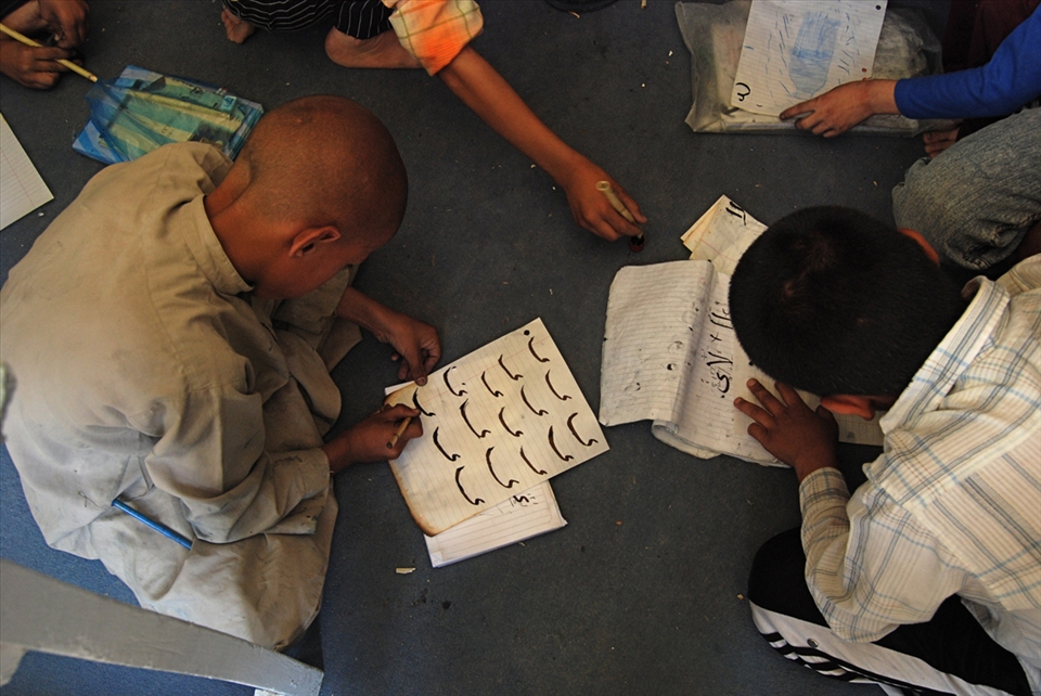 Practice makes perfect. This image was taken at Aschiana, a school run by a local Afghans to teach street children to read and write while also learning trades like carpentry and sewing. 