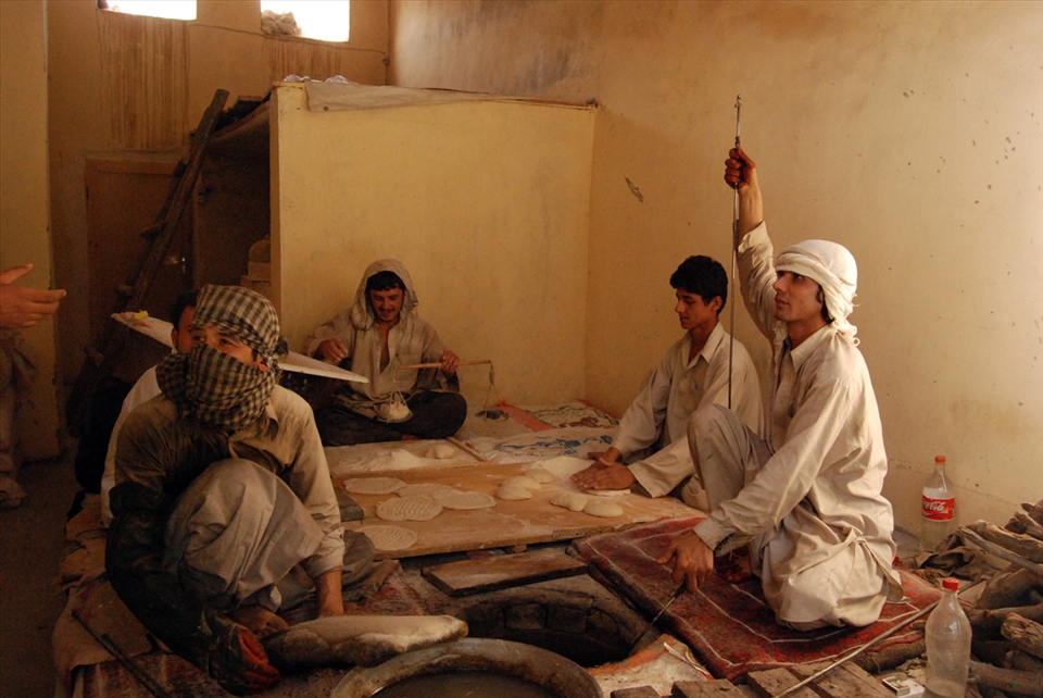 Baking bread in Kabul is labor-intensive as everything is done by hand. Each person has his role from weighing, kneading and shaping. The dough is then placed in a tandoor, an underground clay oven for a few minutes. And yes it tastes delicious.
