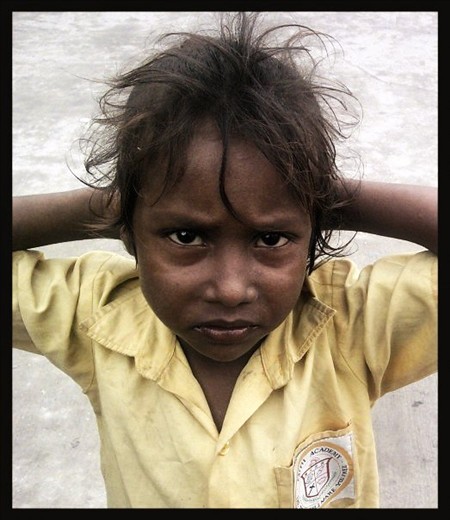 This little child is the face of street children in India. Life captured.