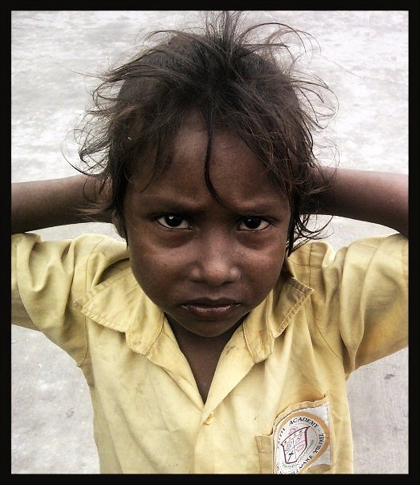 This little child is the face of street children in India. Life captured.