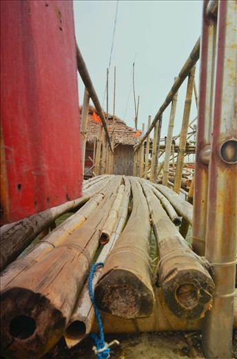 This is a typical bridge for houses near the port area, where children passes by