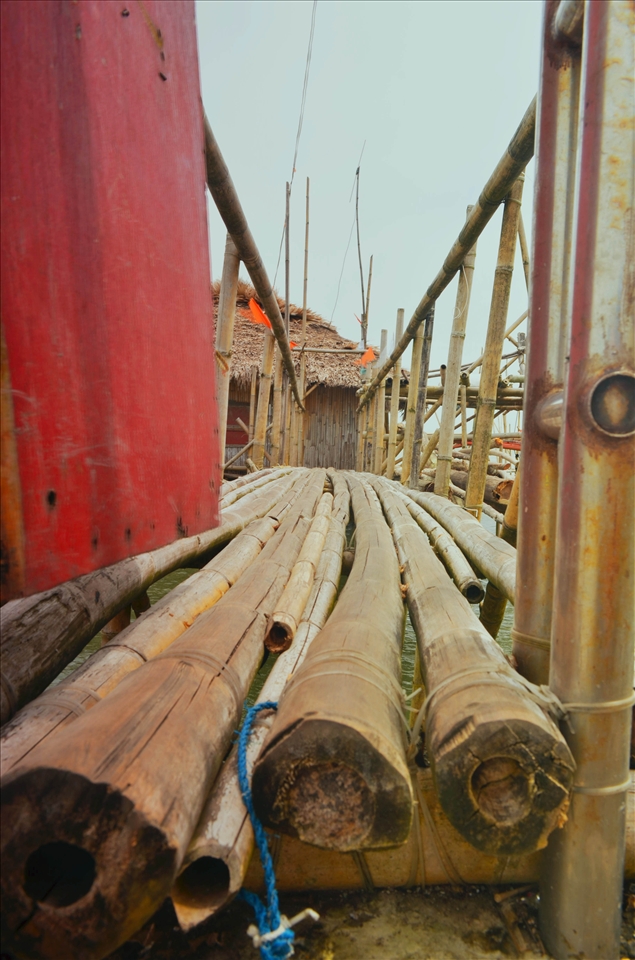 This is a typical bridge for houses near the port area, where children passes by