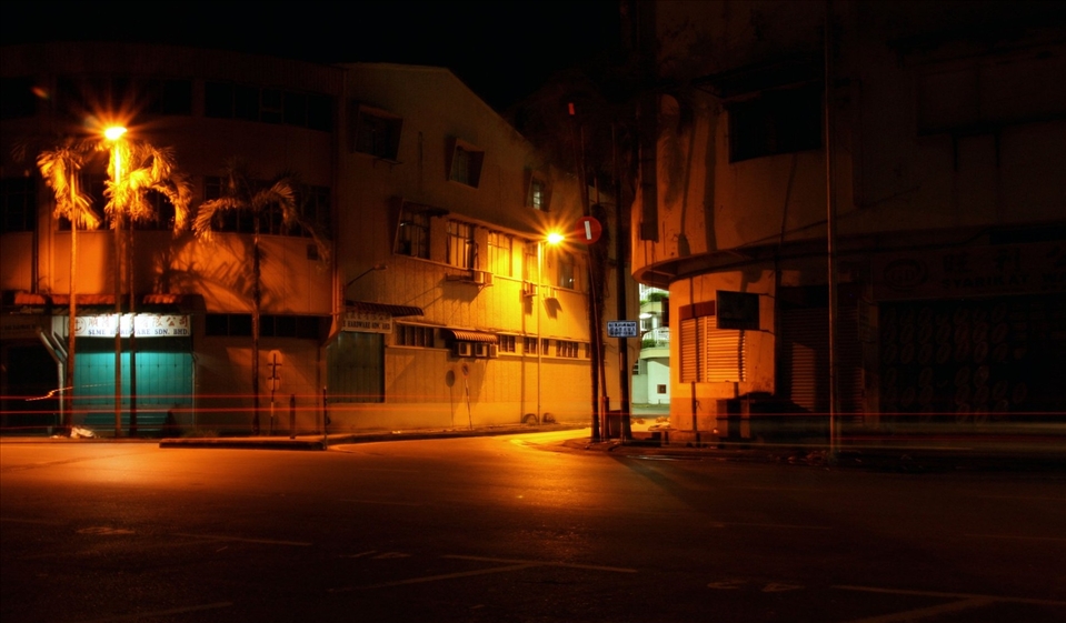 The silence overruled the old town that once bustling with noise. The dim glows in the darkness embrace the heart of a lonely soul.