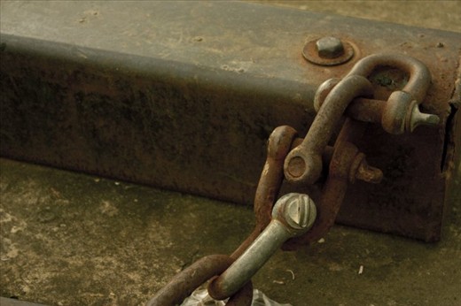 Through the sun and rain, the rusty face witnessed a rusty fate. 