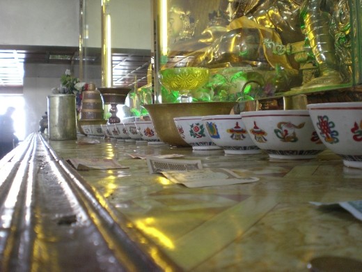 In Mongolia, people have big consideration for the people who died, as well as other things. Often they left money as a strong symbol of those feelings. I wanted to show a view of some bank notes as almost one more piece of the altar.