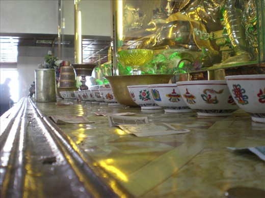 In Mongolia, people have big consideration for the people who died, as well as other things. Often they left money as a strong symbol of those feelings. I wanted to show a view of some bank notes as almost one more piece of the altar.