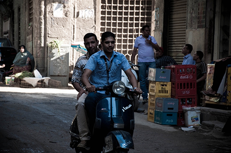 Vespa, the common mean of transportation through the small alleys.