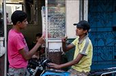 A child watches two teenagers trying to prove their manhood sharing cigarettes: by aldarbelahmar, Views[607]