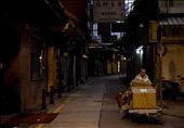 Macau, China - A man gets ready to go to work early in the morning along St Paul's Road in Macau a few days before the start of the New Year of the Gregorian Calendar.: by alec_corpuz, Views[284]