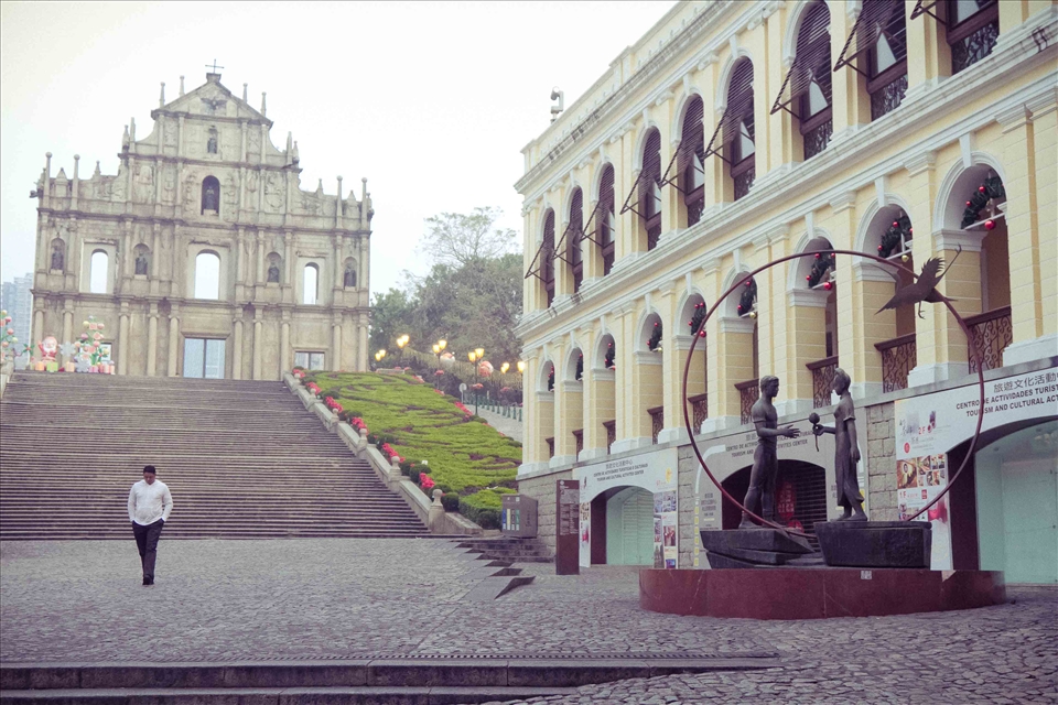 Macau, China - A man takes an early morning walk along the Ruins of St. Pauls in Macau. The Ruins of St. Paul's Cathedral is all that remains of what was once the largest cathedral in Asia built by the Jesuits.
