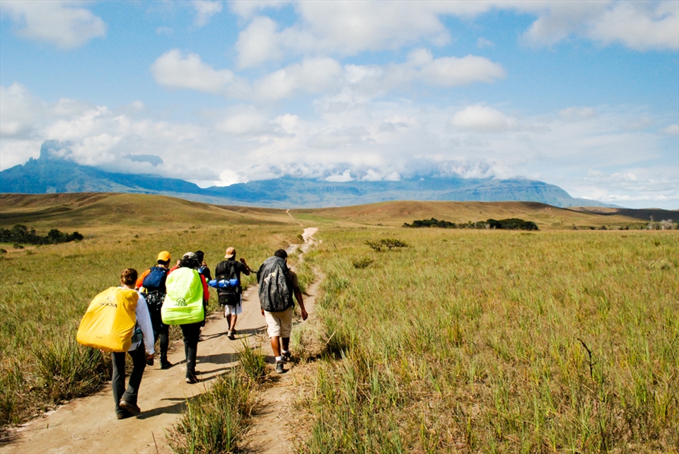 Trekking begins with a few hills and an open savanna with Roraima on the back 