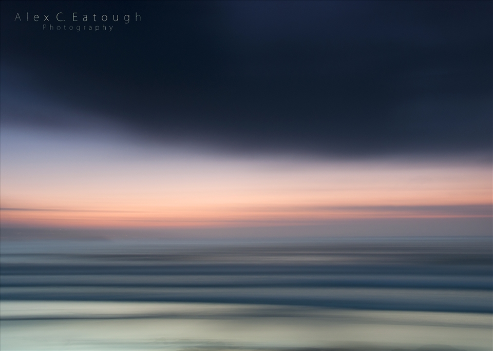 Experimentation with long exposure panning of incoming waves at Godrevy beach lead to this picturesque abstract interpretation of the moving ocean at sunset.