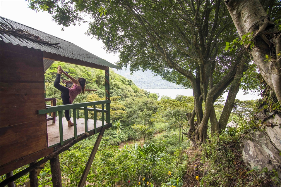 A treehouse is the perfect view for a personal yoga practice. 