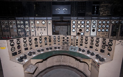 In Control
After a scout around, the entrance was located and, after squeezing through some very tight spaces, we set about finding the good bits. Much of the interior of the building is now gone, with no generators or really anything of note in the main bulk. There were, however, two virtually untouched control rooms, which would once have controlled the supply of power to most of South London.
The station is the largest brick building in Europe and despite numerous efforts at restoration (most recently by a Malaysian company who purchased the site for £400million) it has remained abandoned.
Aware that we had other things to see, we made a visit to this London gem a quick one.
