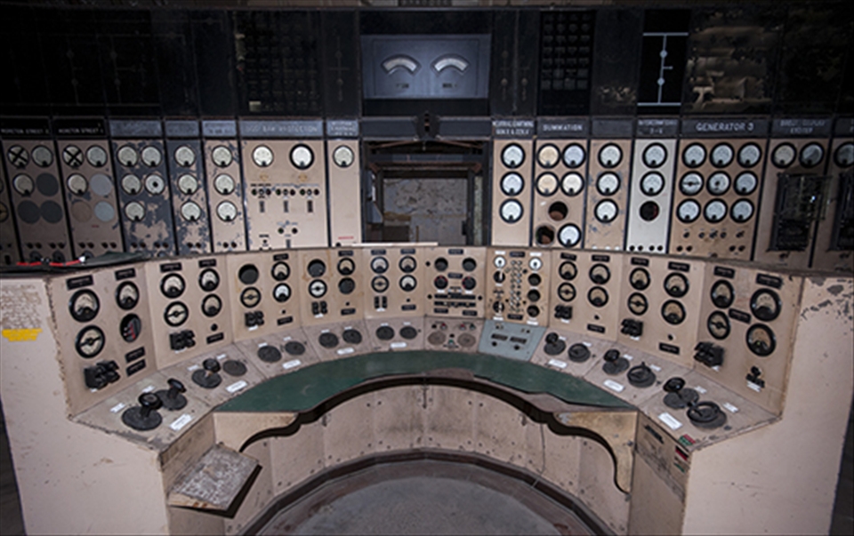 In Control
After a scout around, the entrance was located and, after squeezing through some very tight spaces, we set about finding the good bits. Much of the interior of the building is now gone, with no generators or really anything of note in the main bulk. There were, however, two virtually untouched control rooms, which would once have controlled the supply of power to most of South London.
The station is the largest brick building in Europe and despite numerous efforts at restoration (most recently by a Malaysian company who purchased the site for £400million) it has remained abandoned.
Aware that we had other things to see, we made a visit to this London gem a quick one.
