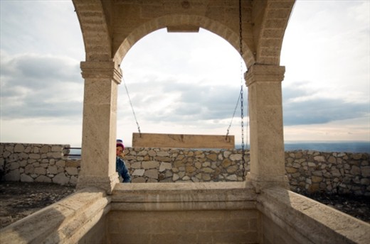 Bell tower is made from the same calcareous stone and all the place is surrounded with stone walls like the old citadels.Even encountered a small villager that told a little story about the time the church was build.