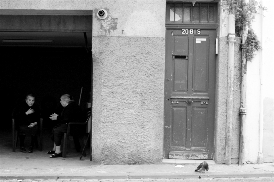 TWO WIDOWS, Perpignan, France: With the assistance of my poor grasp of French, and various illustrative hand movements gesturing to the women on the left, asking her how long she had lived in this neighborhood for. Expecting her to say something like 40 years. She responded with, “I came from Turkey only 2 years ago with my husband, but he died last week.”