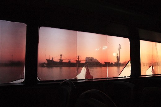 Two cargo ships wait in the local shipyard to be dismantled and sold. Sulina, Danube Delta, Romania