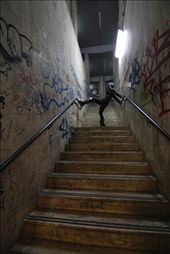 I tried a few times to bring some motion to Ffion which payed off in this shot, as she continued to climb about this dramatically lit stairwell. I loved everything about this train station, the lighting, the stone passages plastered with graffiti, the bold angles, and brilliant colours. Looking back, Im really glad we missed our train that evening, being left to wander freely, while keeping high in spirit. : by alfiealf, Views[305]