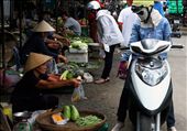 A common scene at a local Vietnamese market: Motorbike drivers have to completely cover themselves in order to avoid the smog of the city.  On a time on which the world seems to be rushing and globalization threatens on reaching every corner of it, one can still find these unique moments that reflect the idiosyncrasy of a country rich in culture and tradition trying to adapt itself to a bigger change.: by alfredoparedes, Views[640]